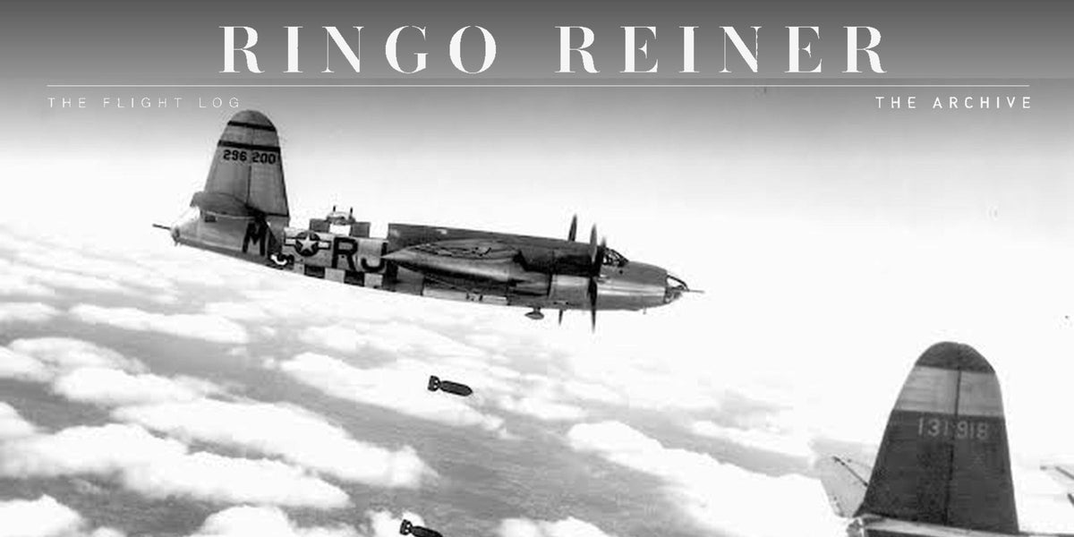 Archival black-and-white photograph of B-26 Marauder aircraft flying above the clouds during a bombing mission.