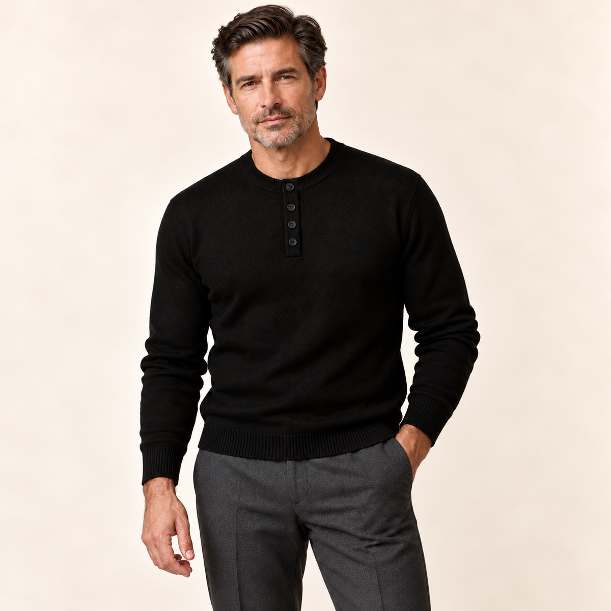 Mature man wearing the Ringo Reserve No. 01 black Italian cashmere sweater with a tailored fit and tonal four-button placket.