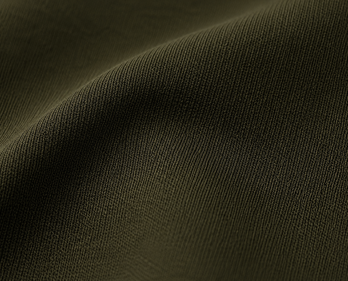 Close-up of Olive Drab fabric on the Ringo Reiner Founder Polo
