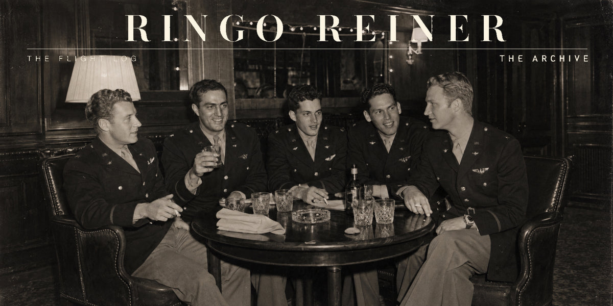 Archival photograph of Ringo Reiner seated with four fellow U.S. Army Air Corps officers gathered around a table.